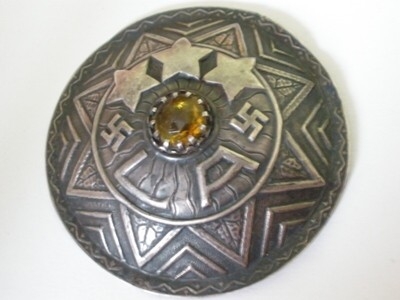 A brooch of 19th regiment of Jaunlatgale (female aizsargi).