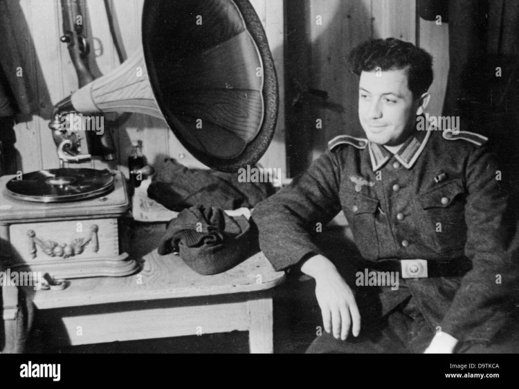 a-soldier-listens-to-music-on-a-phonograph-on-the-eastern-front-21-D9TKCA.jpg